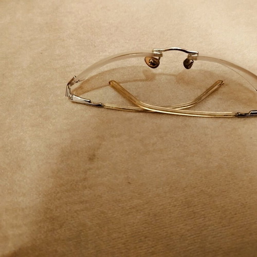 Salvatore Ferragamo sunglasses authentic, like new, clear silver rimless