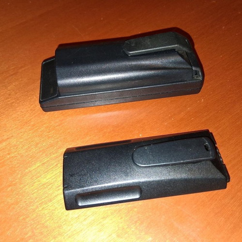 Ericsson charging base and two used batteries Type 4225 and 3009/3008