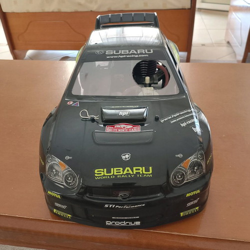 Gas-powered remote control Subaru racing car like new