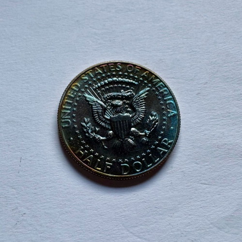 Kennedy Half Dollars 1986 D in excellent condition with rainbow patina