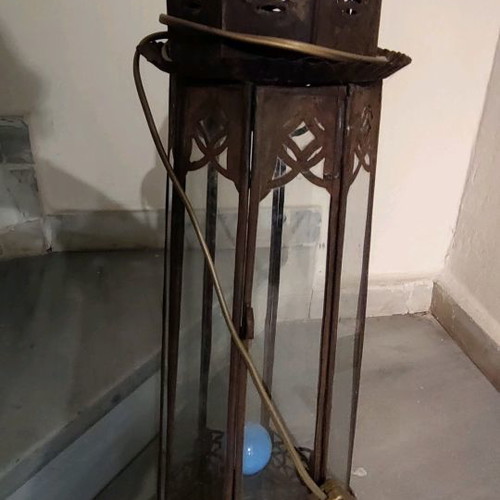 Metal vintage decorative garden lantern used with blue lighting
