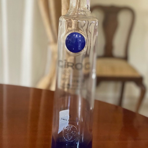 Empty premium liquor bottles and cocktail shaker like new