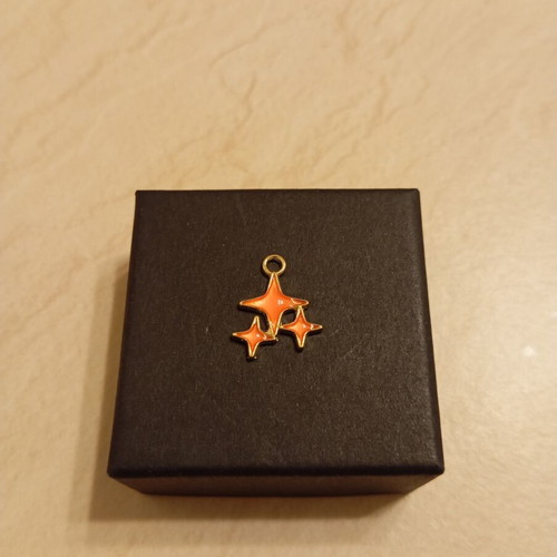 Pendant with star design, gold plated, new