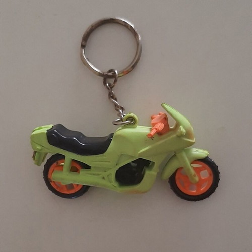 Vintage motorcycle and bicycle keychains used, colorful