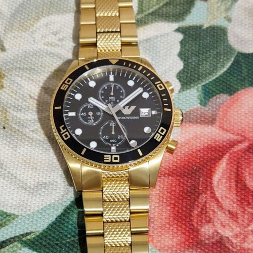 Emporio Armani men's watch in gold color like new