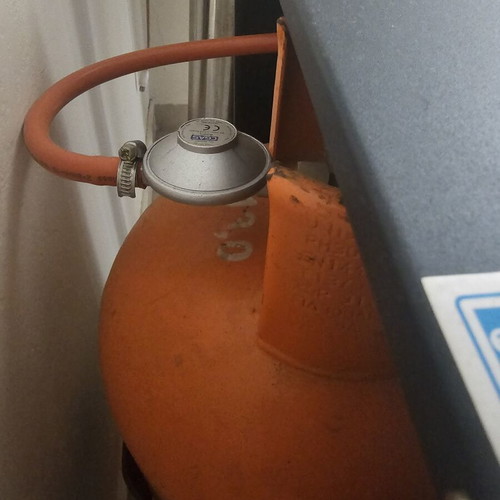 Heater used with bottle of gas