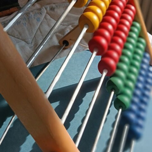 Wooden abacus with 10 rows, colored beads