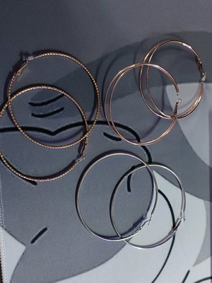 Set of 3 large hoop earrings like new, gold and silver