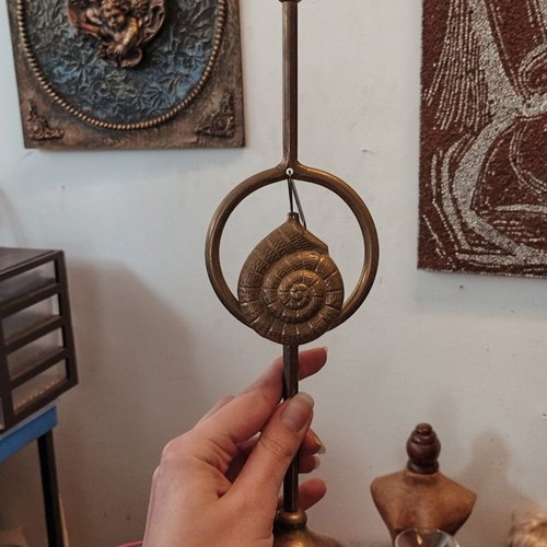 Vintage candle holder with hanging shell element used