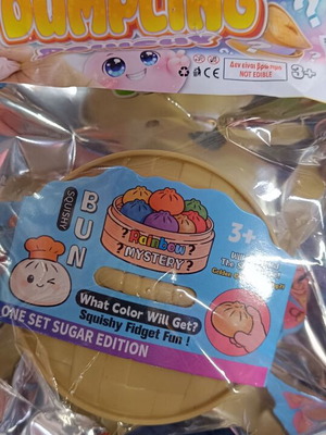 Mystery dumpling squishy bao bun new, rainbow colors