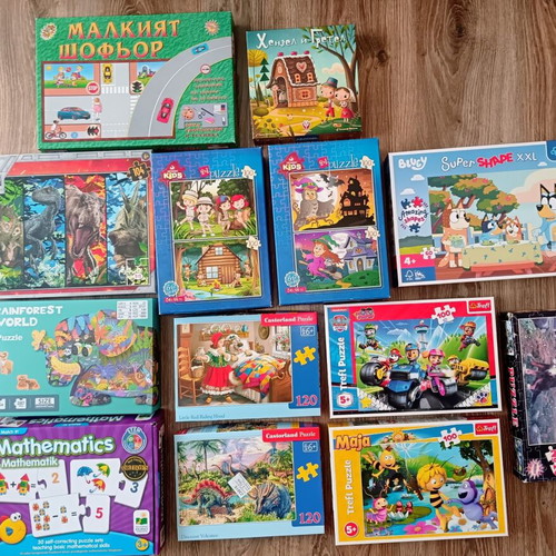 Children's puzzles and board games used, ages 4 to 8
