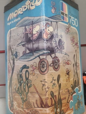 Heye Flight to Atlantis 750-piece Mordillo puzzle