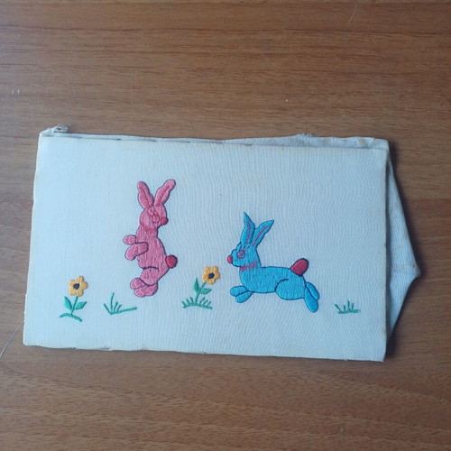 Vintage embroidery with rabbits like new, colorful spring design
