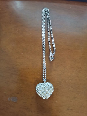 Heart-shaped necklace used, silver color
