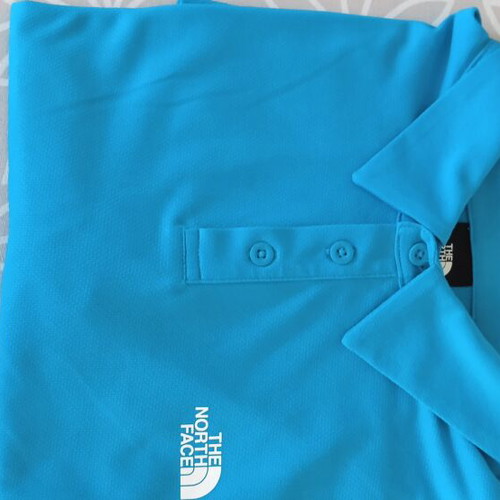 The North Face polo shirt like new, medium, blue
