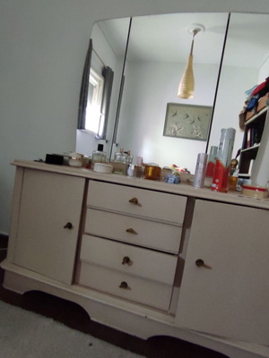 Living room buffet with large mirror, 2 cabinets and 4 drawers used