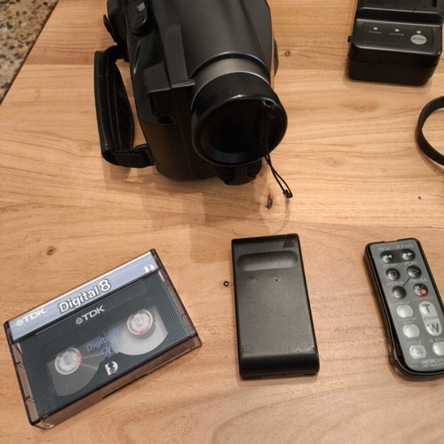 Hitachi H825LE 8mm video camera recorder used with accessories