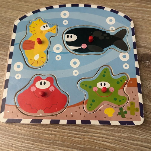 Baby learning puzzles used, 10 wooden cards