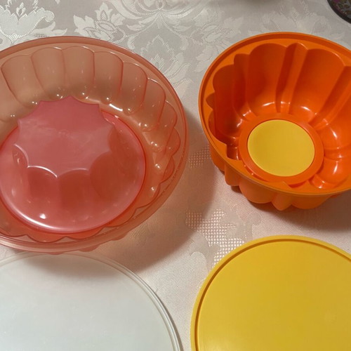 Cake molds used, set of two, one lid cracked but closes