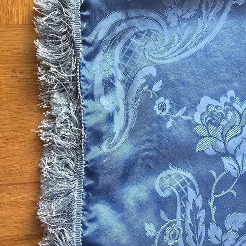 Vintage blue satin bedspread with fringes, used