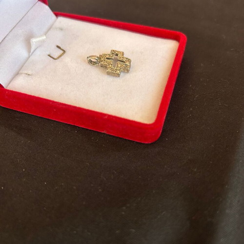 Silver embossed cross used