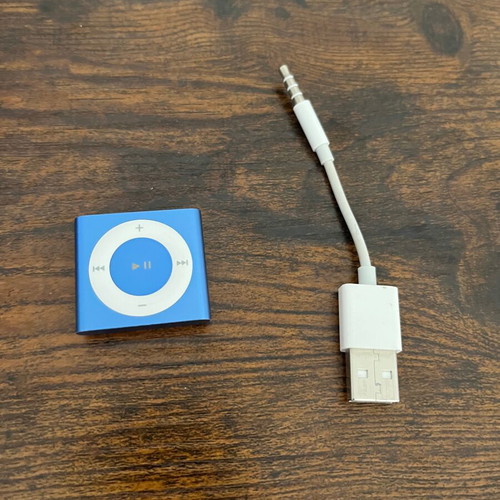 iPod Shuffle 4th Gen new with headphones gift