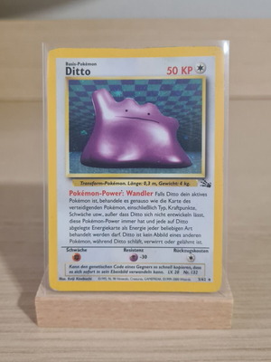 Карта Ditto Holofoil употребявана, Fossil 1999–2000 немско издание