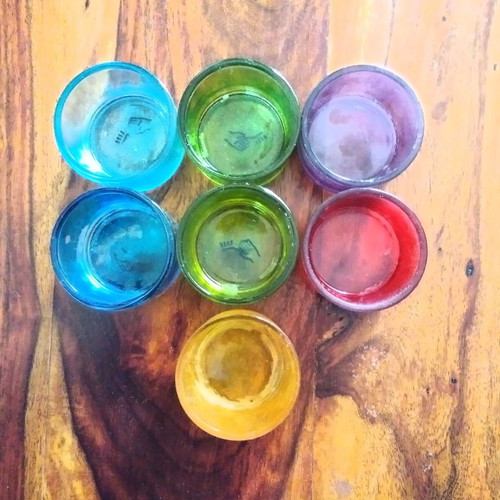 Colored tealight holders used, set of seven