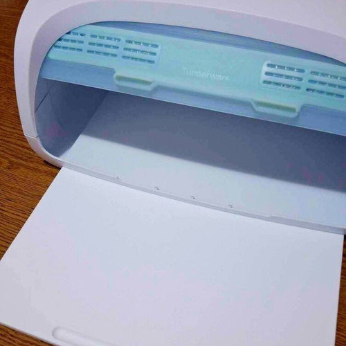 Tupperware bread box new with integrated cutting board