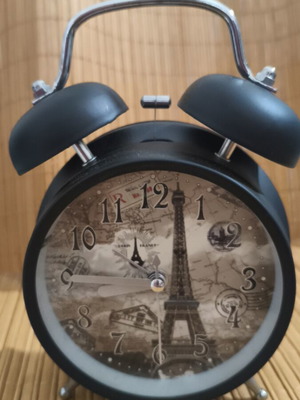 Retro alarm clock with Eiffel Tower theme like new