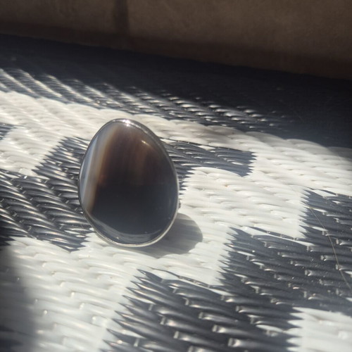 Adjustable ring like new, brown