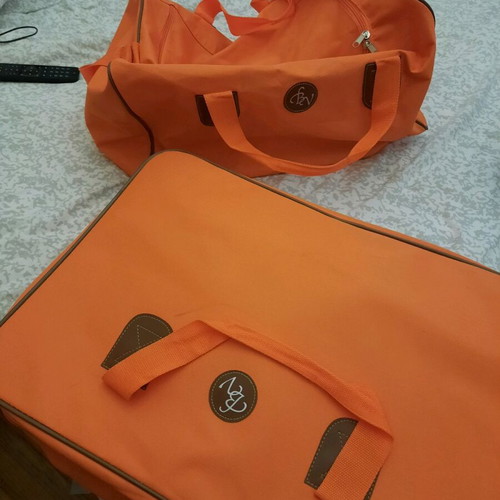 Suitcase and travel sack set like new, orange waterproof material