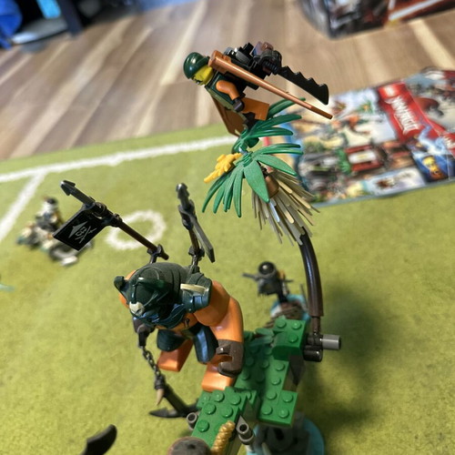Lego Ninjago set 70604 with minifigures and instructions