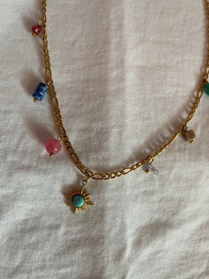 Gold charm necklace colorful like new