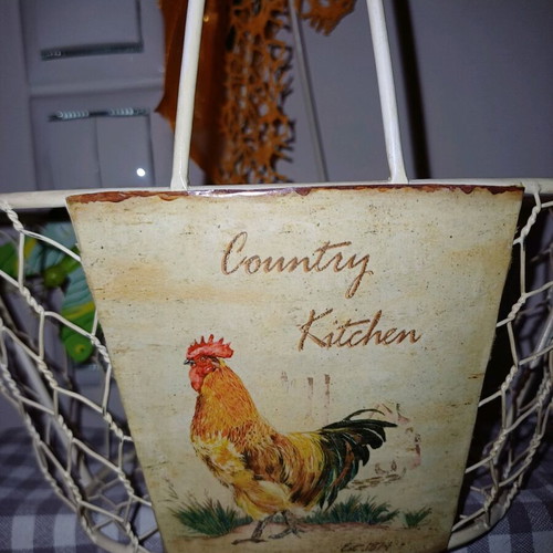 Metal basket new decorated with ribbons, flowers and butterflies