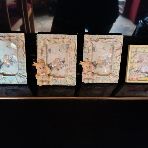 Set of 4 baby photo frames, 3 vertical and 1 horizontal