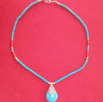 Handmade necklace with natural Iranian turquoise and coral stones, new