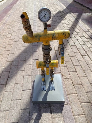 Robot yellow new made of recycled metal