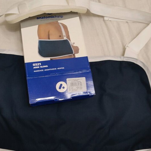 Arm sling adjustable, like new, blue