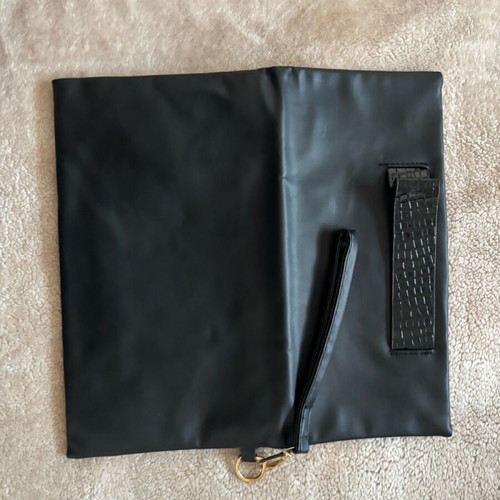 Handheld black clutch bag like new with leather detail