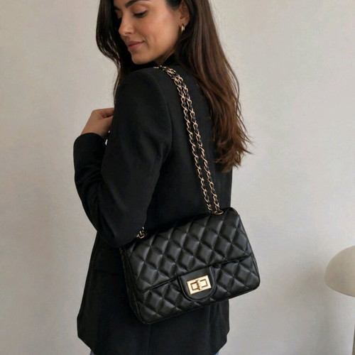Quilted shoulder bag with chain like new, black