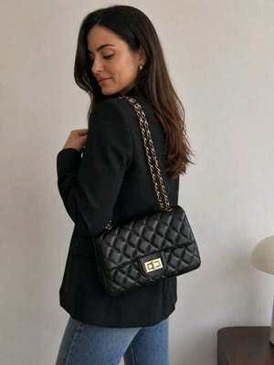 Quilted shoulder bag with chain like new, black