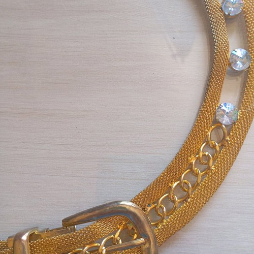 Adjustable metal belt like new with rhinestones gold color