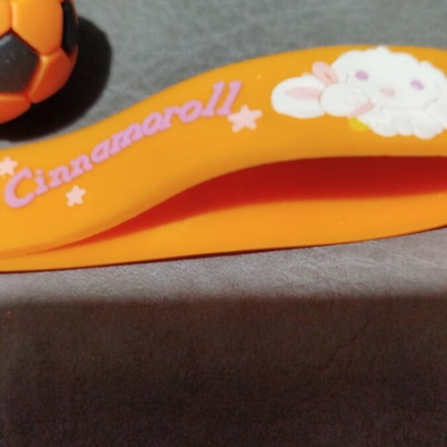 Keychain with orange football ball made of rubber new