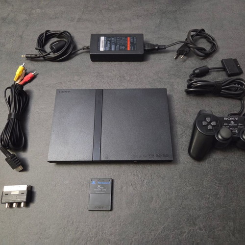 Sony PlayStation 2 SCPH-75004 Slim console used with Dualshock and accessories