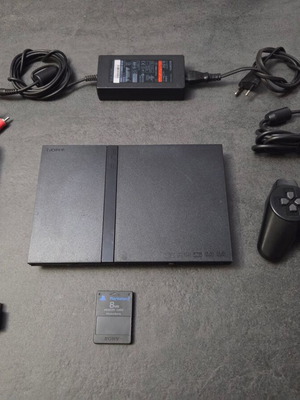 Sony PlayStation 2 SCPH-75004 Slim console used with Dualshock and accessories