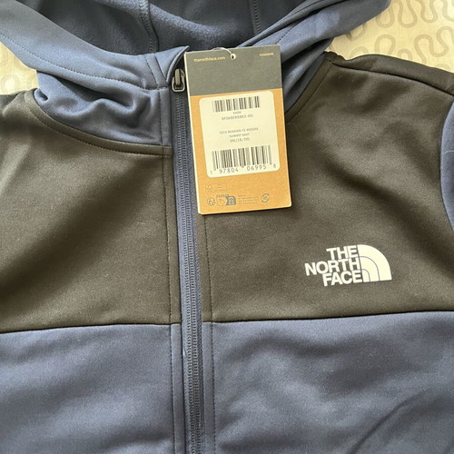 The North Face jacket brand new, 18-20 years old, black and blue