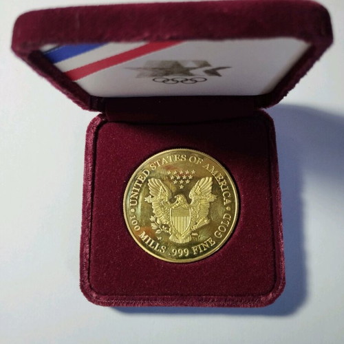 Liberty Eagle gold-plated medal in velvet case like new