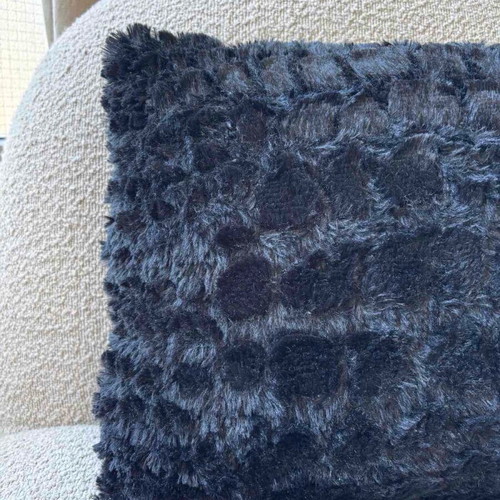 Wide fur pillow like new, black with removable fabric