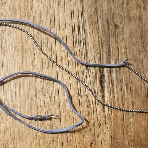 Necklace with leather strap and silver chain like new